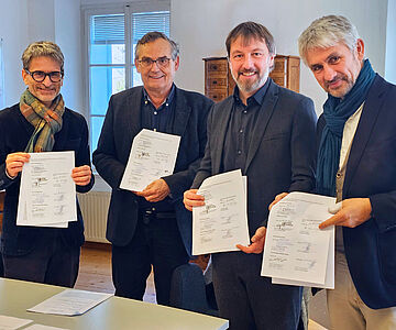 Kooperationspartner mit unterschriebenen Verträgen