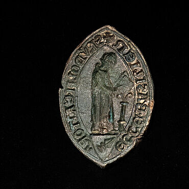 Mittelalterlicher Siegelstempel vom Fuß der Pfalzmauer Mittelalterlicher Siegelstempel vom Fuß der Pfalzmauer