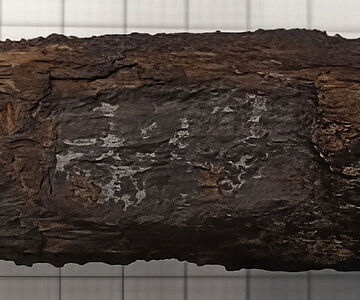 Freigelegte Inschrift auf der Degenklinge